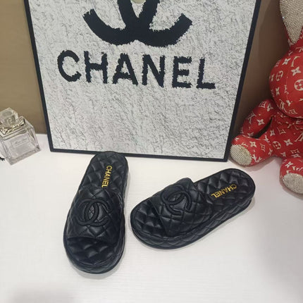 CHANEL 26S QUILTED SLIDE SANDALS IN BLACK CALFSKIN