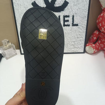 CHANEL 26S QUILTED SLIDE SANDALS IN BLACK CALFSKIN
