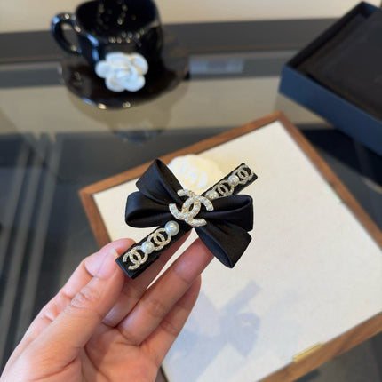 CHANEL 26S HAIR CLIP IN BLACK SATIN BOW 503046