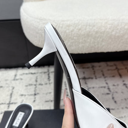 ALAIA 26S HEELED MULES 65 MM IN WHITE GLOSSY CALFSKIN