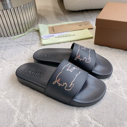 BURBERRY 26S EQUESTRIAN KNIGHT RUBBER SLIDES IN BLACK CALFSKIN