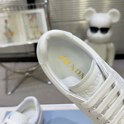 PRADA 26S LACE UP SNEAKERS IN WHITE CALFSKIN