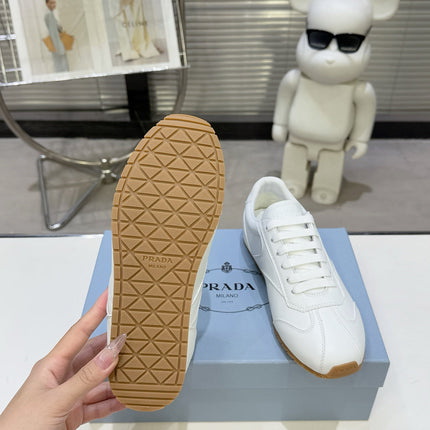 PRADA 26S LACE UP SNEAKERS IN WHITE CALFSKIN