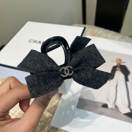 CHANEL 26S BOW HAIR CLIP IN BLACK RIBBON 505311