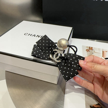 CHANEL 26S BOW HAIR TIE IN BLACK WITH WHITE POLKA DOTS 505302