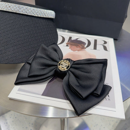 CHANEL 26S HEADBAND IN BLACK SATIN 503079