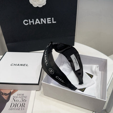 CHANEL 26S HEADBAND IN BLACK FABRIC 503082