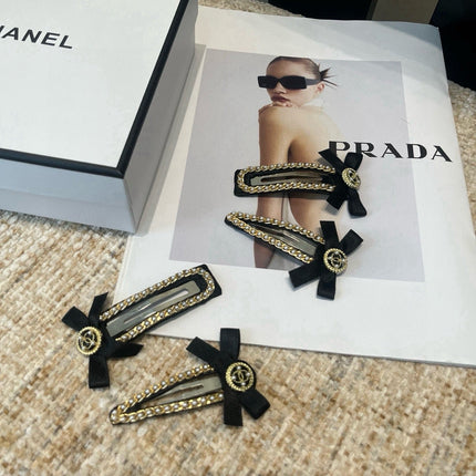 CHANEL 26S BOW HAIR CLIP IN BLACK FABRIC 505310