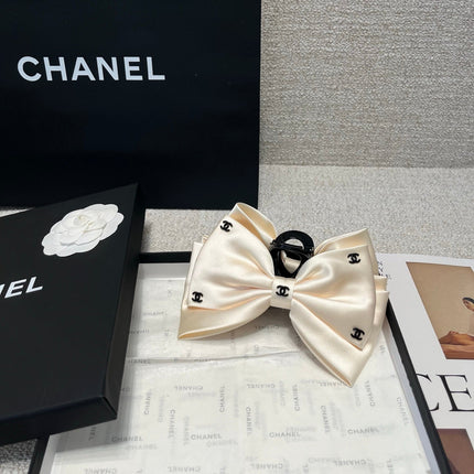 CHANEL 26S BOW HAIR CLIP IN WHITE RIBBON 512127
