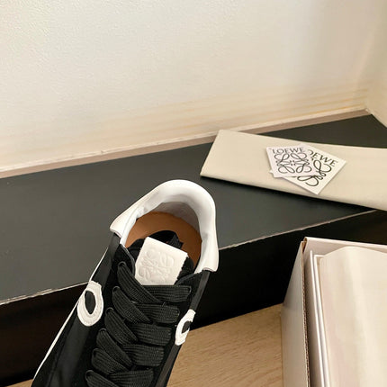 26S FLOW RUNNER SNEAKER IN BLACK SUEDE AND WHITE SHEEPSKIN