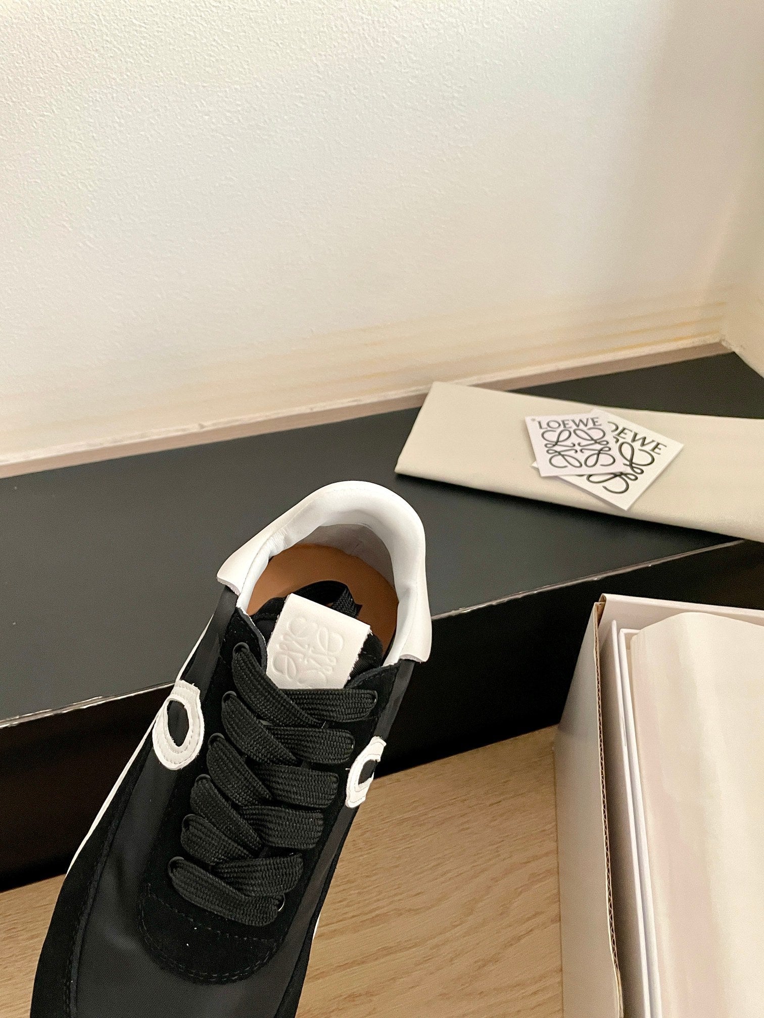 26S FLOW RUNNER SNEAKER IN BLACK SUEDE AND WHITE SHEEPSKIN