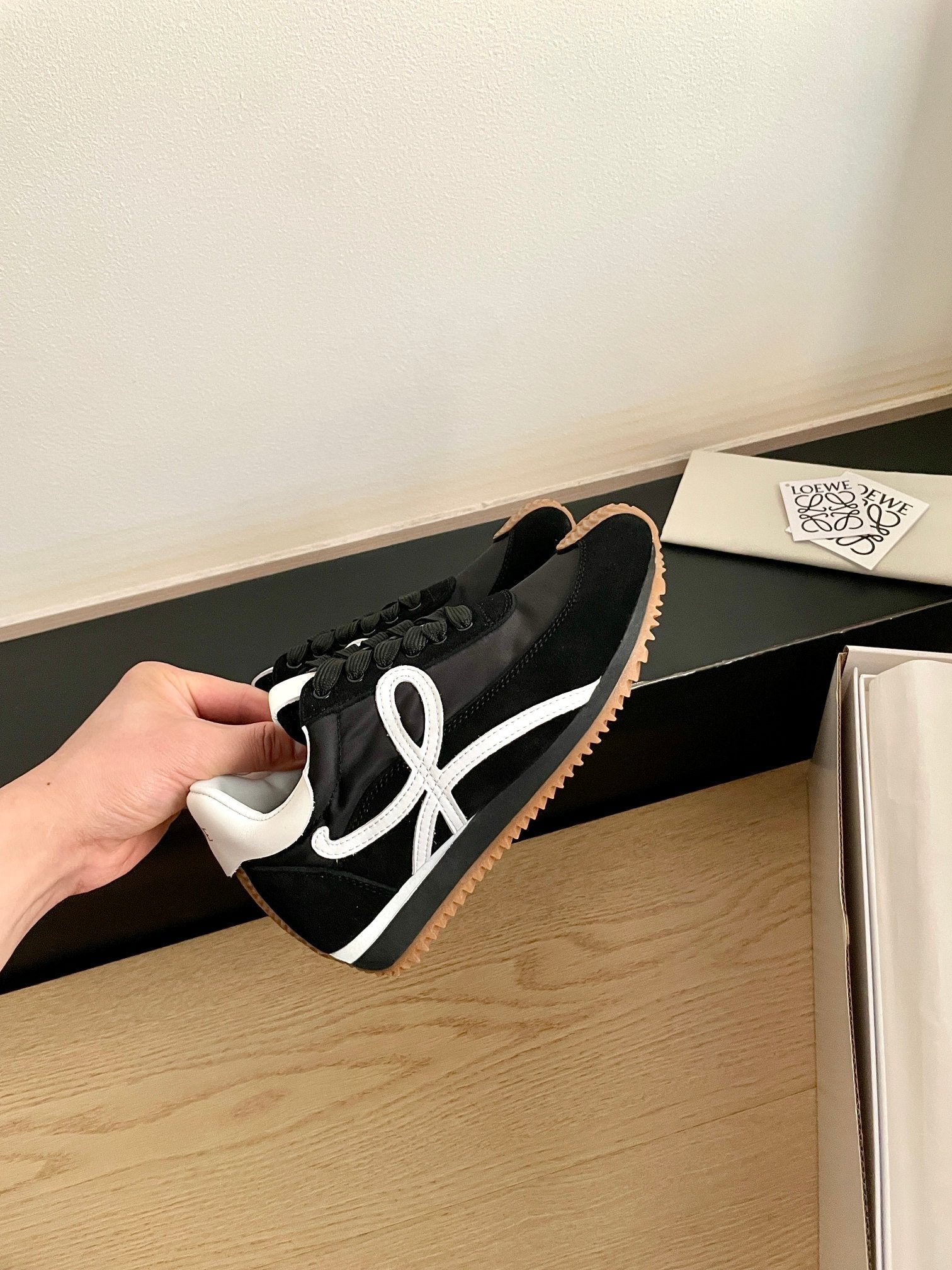 26S FLOW RUNNER SNEAKER IN BLACK SUEDE AND WHITE SHEEPSKIN