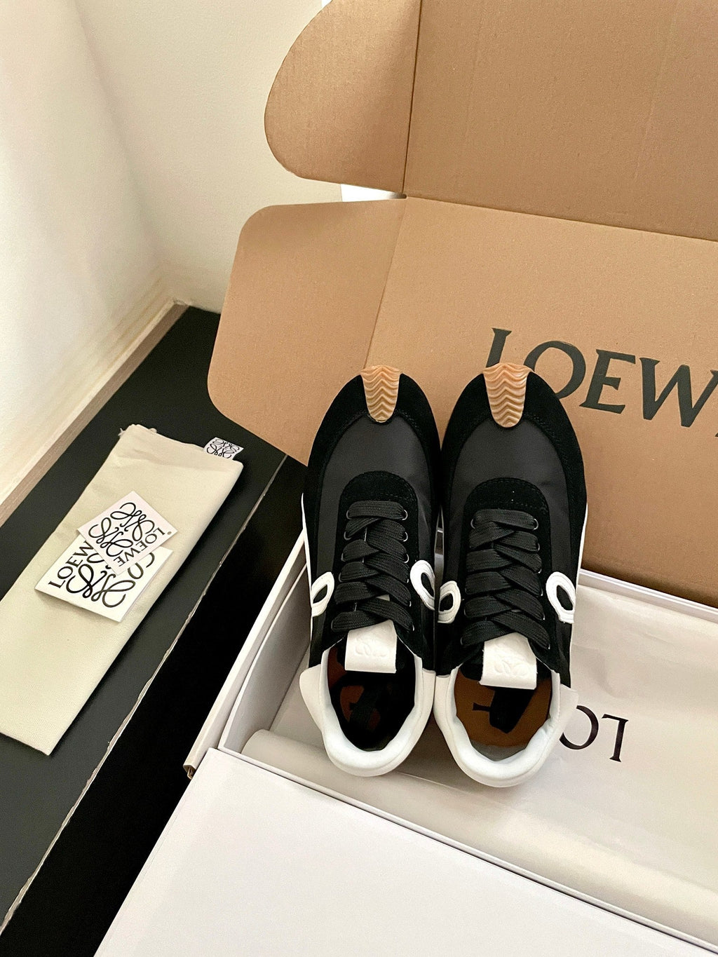 26S FLOW RUNNER SNEAKER IN BLACK SUEDE AND WHITE SHEEPSKIN