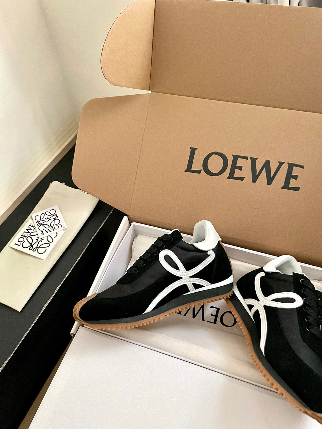 26S FLOW RUNNER SNEAKER IN BLACK SUEDE AND WHITE SHEEPSKIN