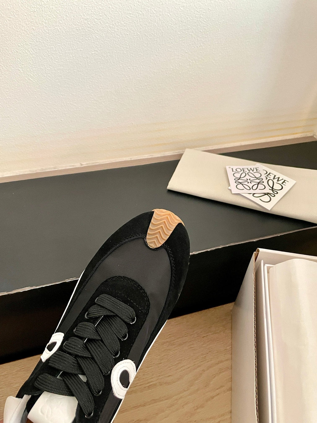26S FLOW RUNNER SNEAKER IN BLACK SUEDE AND WHITE SHEEPSKIN