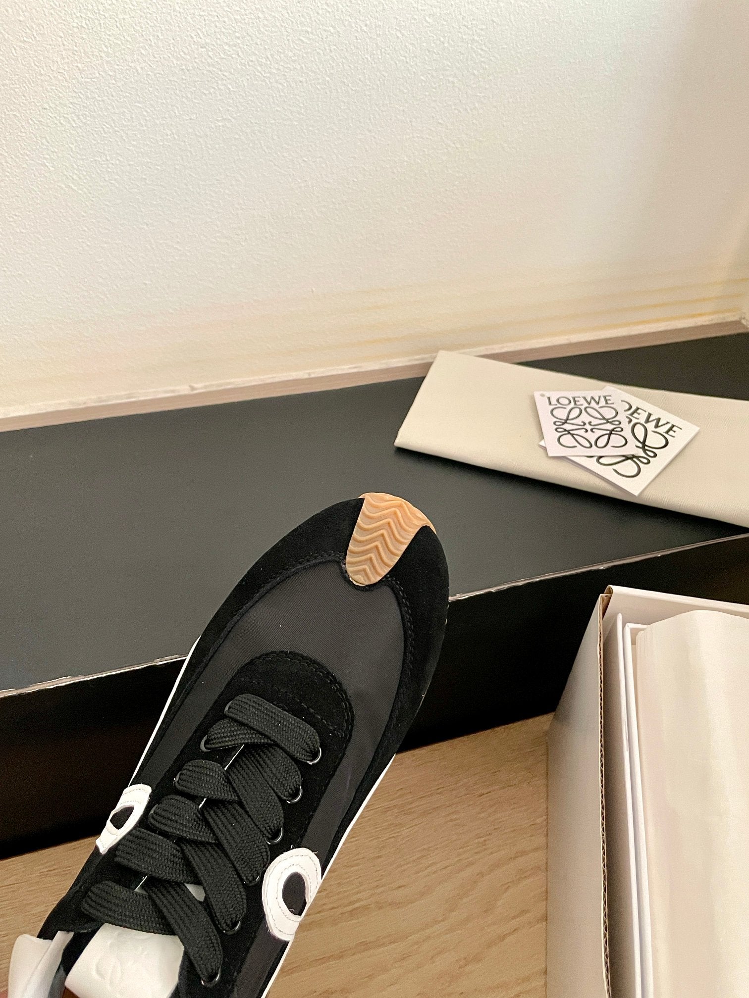 26S FLOW RUNNER SNEAKER IN BLACK SUEDE AND WHITE SHEEPSKIN