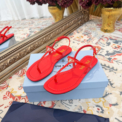 PRADA 26S THONG SANDALS IN RED CALFSKIN TRIANGLE LOGO