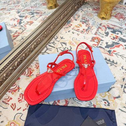 PRADA 26S THONG SANDALS IN RED CALFSKIN TRIANGLE LOGO