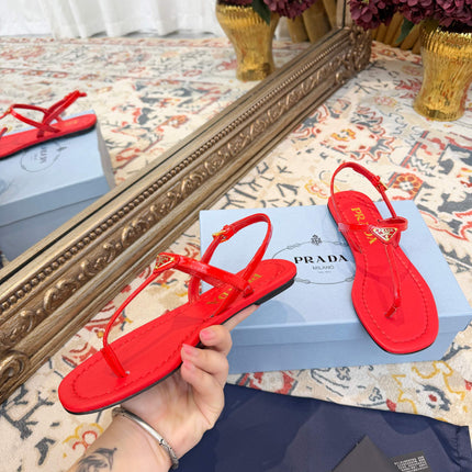 PRADA 26S THONG SANDALS IN RED CALFSKIN TRIANGLE LOGO