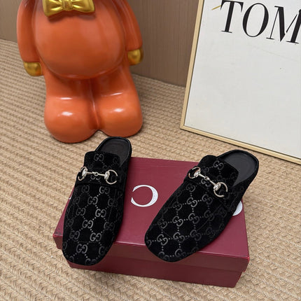 GUCCI 26S FLAT MULES IN BLACK GG EMBOSSED SUEDE
