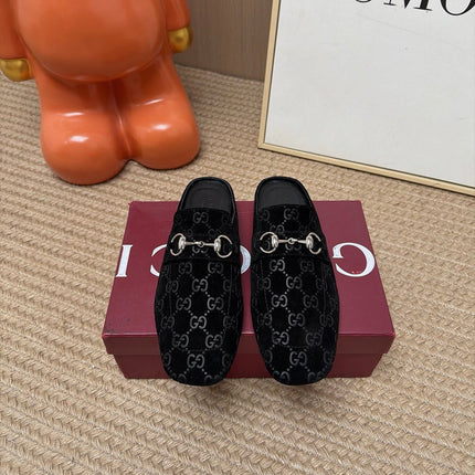 GUCCI 26S FLAT MULES IN BLACK GG EMBOSSED SUEDE