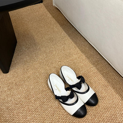 CHANEL 26S MARY JANE SLINGBACK FLATS IN WHITE AND BLACK CALFSKIN CAP TOE RIBBON STRAP