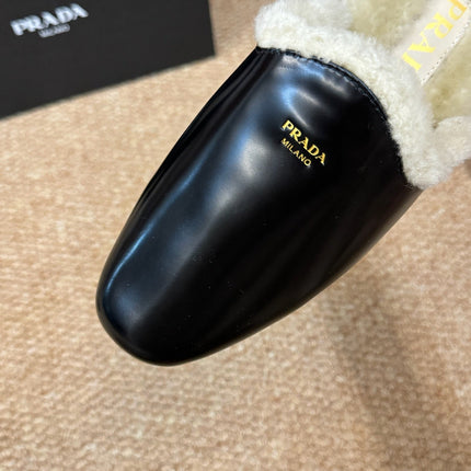 PRADA 26S SHEARLING MULE SLIPPERS IN BLACK CALFSKIN