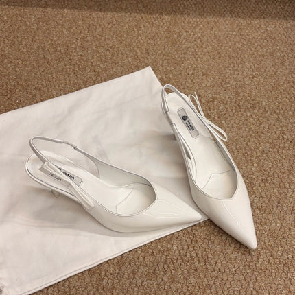 PRADA 26S SLINGBACK PUMPS IN WHITE PATENT CALFSKIN