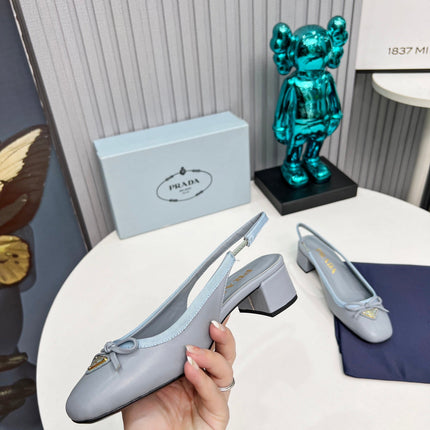 PRADA 26S ROUND TOE SLINGBACK PUMPS 40MM IN LIGHT BLUE CALFSKIN WITH BOW