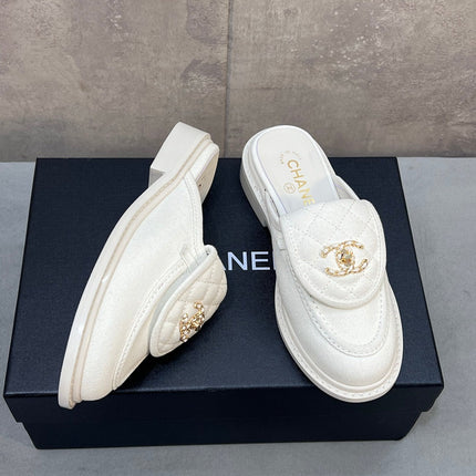 CHANEL 26S MULE LOAFERS IN WHITE CANVAS WITH QUILTED FLAP & CC LOGO