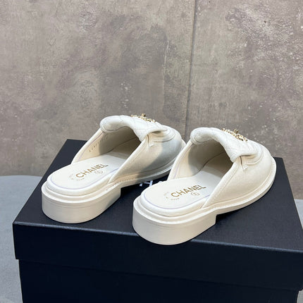 CHANEL 26S MULE LOAFERS IN WHITE CANVAS WITH QUILTED FLAP & CC LOGO