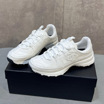 CHANEL 26S RUNNER CC LOGO SNEAKERS IN WHITE CALFSKIN
