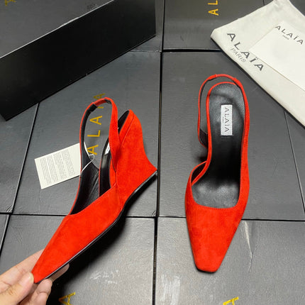 ALAIA 26S WEDGE SLINGBACKS 95 MM IN ORANGE RED SUEDE