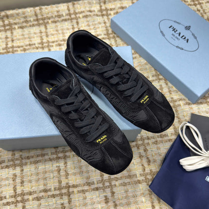 PRADA 26S LOW TOP SNEAKERS IN BLACK NYLON AND SUEDE