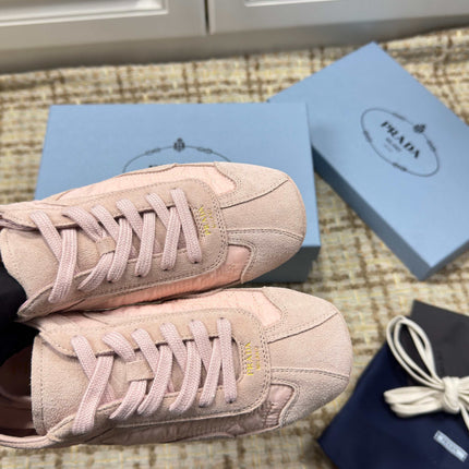 PRADA 26S LOW TOP SNEAKERS IN PINK NYLON AND SUEDE
