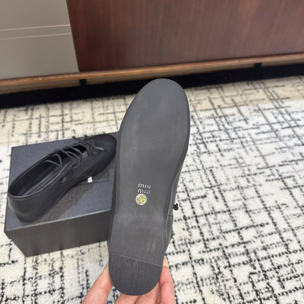 MIUMIU 26S LACE UP BOW LOAFERS IN BLACK CALFSKIN