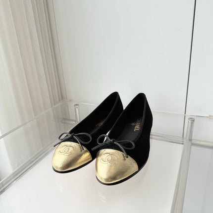 CHANEL 26S BALLET FLATS IN BLACK SUEDE WITH GOLD TOE CAP AND BOW