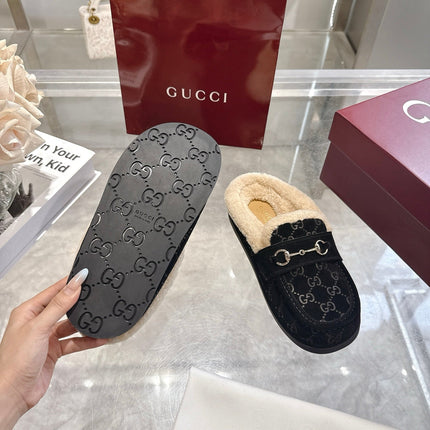 GUCCI 26S MULES IN BLACK SUEDE GG LOGO PATTERN