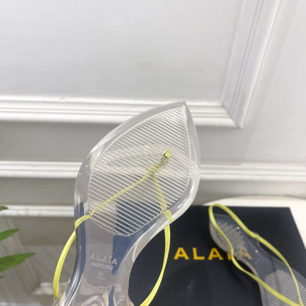 ALAIA 26S POINTED-TOE THONG SANDALS IN LIGHT YELLOW SATIN AND TRANSPARENT PVC