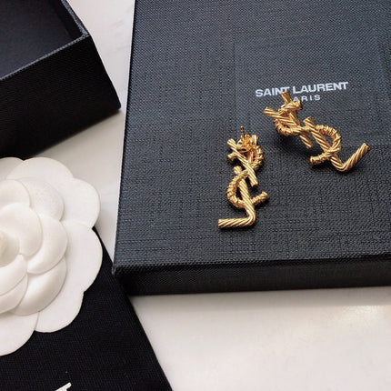 YSL 26S TWISTED ROPE LOGO STUD EARRINGS IN GOLD TONE METAL 629135